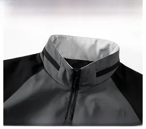 Detail of men's casual jacket featuring a stand collar design with black and grey colors