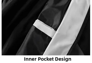 Detail of the inner pocket design on a sleek black and white athletic jacket for men