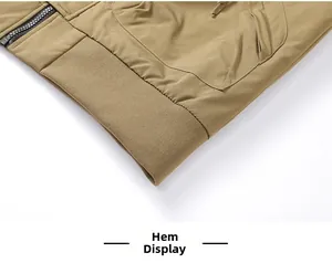 Detail of the elastic ribbed hem and high-quality zipper on a khaki flight jacket