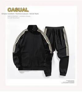 Detail view of the black sports jacket cuff and three side stripes on high-quality fabric
