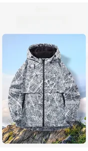 Detail of windproof jacket featuring black and white architectural map print and hood