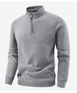 Detail of the grey knitted fleece texture on this men's quarter-zip outdoor pullover
