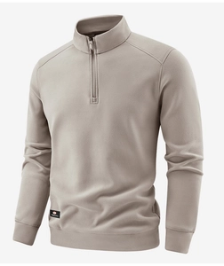 Detail of soft high-density fleece texture with 1/4 zip collar and branded label