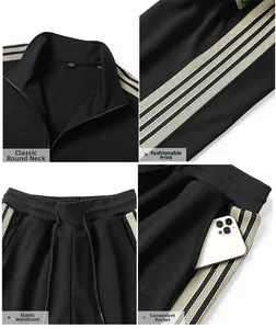 Detail view of black tracksuit features side stripes, zipper neck, and functional pockets