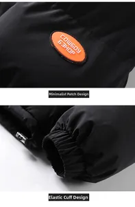 Detail of black hooded jacket featuring orange Cowboy Bebop patch and elastic ribbed cuffs