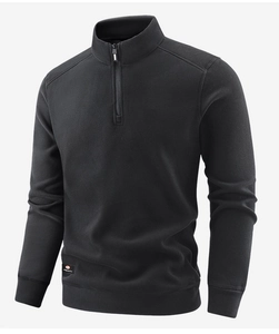 Detail of black thermal fleece pullover with stand collar and half-zip fastening