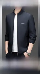Detail of navy blue men jacket showing technical grid fabric and zip pocket on chest