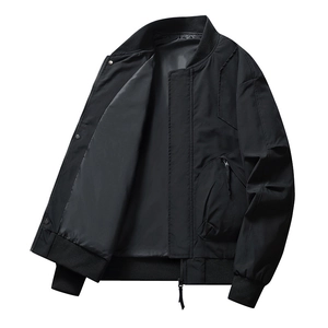Men's black windproof bomber jacket with utility zipper pocket on white background