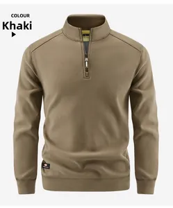 Close-up of brown half-zip fleece pullover with stand collar and textured fabric