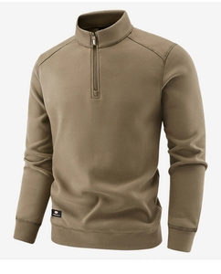 Detail of khaki fleece quarter-zip pullover with standing collar and ribbed hem