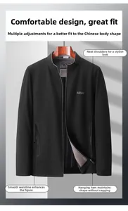Detail view of dark grey business jacket showing high-quality honeycomb texture and logo