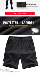 Detail view of quick-dry black sports shorts featuring zip pockets and 4-way stretch fabric