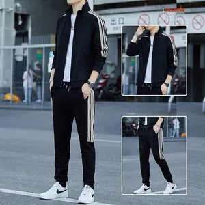 Men's black tracksuit set with stand collar zipper jacket and beige striped joggers