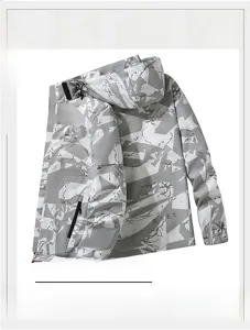 Detail of waterproof camouflage outdoor jacket featuring hooded design and zipper pockets