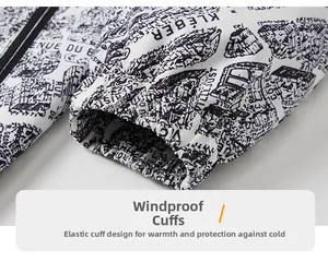 Detail of elastic cuffs on a windproof jacket with French street map and architecture print