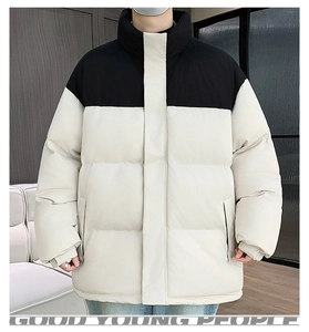Detail view of winter standing collar jacket with black and white color block design