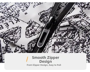 Close-up of smooth black zipper on white graffiti print windbreaker jacket detail
