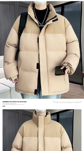 Detailed close-up of khaki two-tone padded puffer jacket with stand collar and zipper