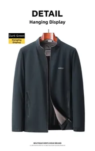 Detail view of dark green casual jacket with stand collar and micro-grid fabric texture