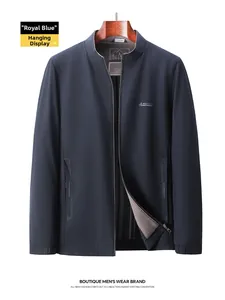 Detailed view of royal blue jacket collar with zip and textured high-tech fabric