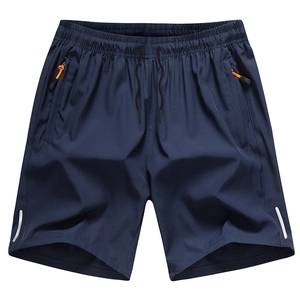 Men's quick-dry navy sports shorts with drawstring waist and orange zipper pocket details