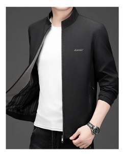 Detail of men's business casual jacket showing stand collar and fine square grid texture