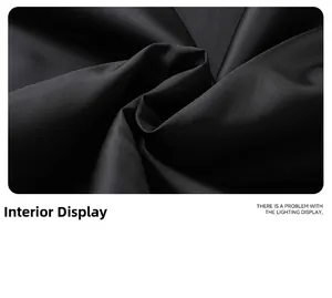 Close-up of premium black twill lining fabric for men's vintage PU leather jacket