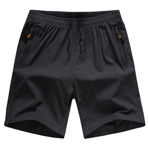 Men's quick-dry black fitness shorts with elastic drawstring waist and orange zipper pockets