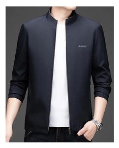 Close-up of windproof fabric texture and logo detail on men's stand collar jacket