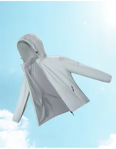 Macro shot of a lightweight, breathable light grey sun protection jacket for outdoor use