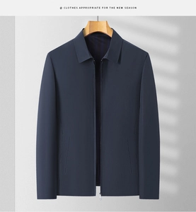 Detailed view of men's dark blue casual jacket with lapel collar and zip closure