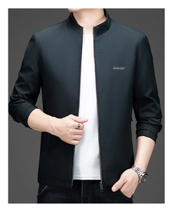 Detail of stand-up collar men's jacket featuring chest logo and fine mesh fabric texture