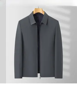 Detailed view of striped jacquard lining and metal zipper on men's dark gray jacket
