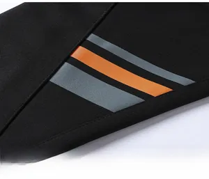 Detailed close-up of knit fabric with premium orange and grey printed stripe design