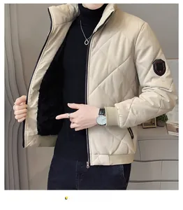 Close-up of diamond quilted men's winter jacket with warm black fleece lining and arm badge