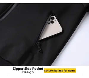 Detail of men's black tracksuit jacket featuring a secure zippered side pocket for phone