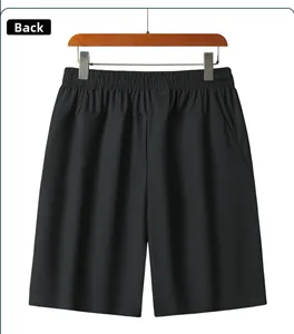 Detailed back view of men's quick-dry sports shorts with elastic waistband and pockets