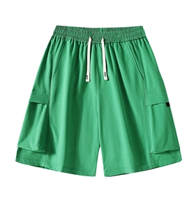 Detail of green cargo shorts with elastic waist, white drawstring and tactical side pockets