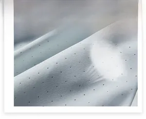 Close-up of lightweight breathable fabric with micro-pores on summer sun protection jacket