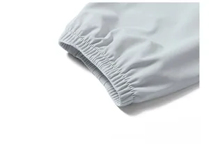 Close-up of elastic cuffs on a lightweight sun protection jacket in light grey