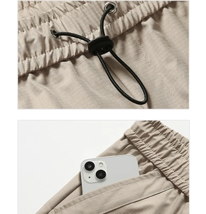 Détail du pantalon cargo ripstop kaki avec cordon de serrage et grande poche latérale utile
