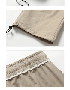 Détail du pantalon cargo kaki avec cordons de serrage réglables et taille élastique