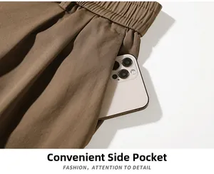 Detail view of khaki casual pants featuring elastic waist and deep side cargo pocket