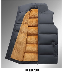 Detail of men's padded vest featuring contrast yellow fleece lining and zip pockets