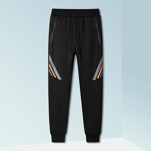 Front view of black sports pants with contrast stripe detail and drawstring waist
