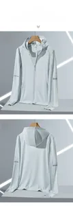 Detail view of light gray hooded sun protection jacket with breathable mesh and sleeve print