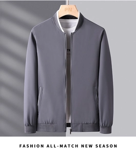 Close-up of grey baseball collar jacket with metal zipper and ribbed cuffs for men