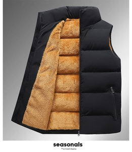 Detailed view of quilted black men's vest with warm orange sherpa fleece lining