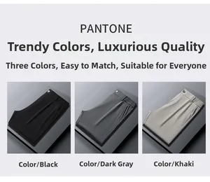 Folded business trousers in black, dark grey, and khaki showing elastic back waistband