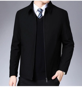Detail of men's business casual jacket featuring a classic stand collar and full zipper closure